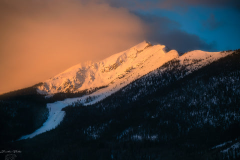 Alpine Glow on a Snowy Morning